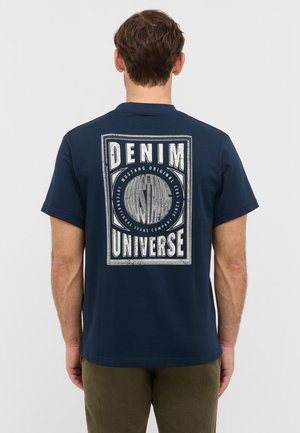 Navy blue cotton t-shirt featuring a large graphic on the back with text "DENIM UNIVERSE" and contrasting white accents. Short sleeves.