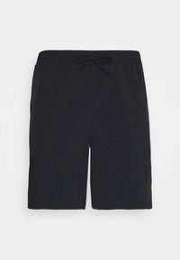 Pantaloni da bagno blu navy realizzati in tessuto leggero, dotati di una vita elastica con cordino e di un piccolo dettaglio del logo giallo.
