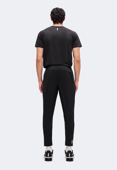 PUMA PWRTRAIN - Tracksuit bottoms - black — photo 3
