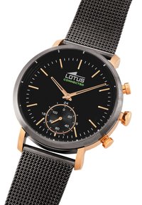 Lotus Connected klocka med svart urtavla, roséguld detaljer, mesh-armband, tre kronografunderkammare och självlysande timmarkörer.