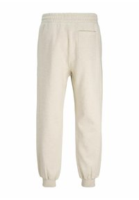 Lys beige sweatpants lavet af blødt stof med elastisk talje, manchetter ved anklerne og en enkelt baglomme.