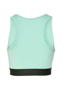 Mintgrøn sportsbh med rund halsudskæring og brede stropper. Har et sort elastikbånd i kanten for støtte. Blød, glat tekstur.