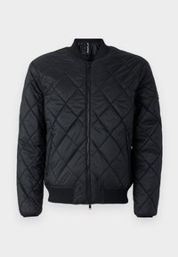 PADDED JACKET - Light jacket - black