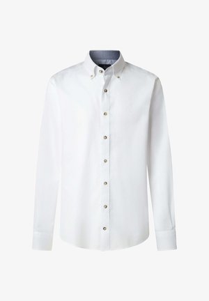 Chemise blanche à manches longues avec col à boutons, présentant des boutons dorés et un col intérieur à motif contrastant.