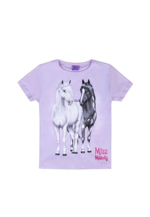 Lilafarbene T-Shirt mit einem Motiv von zwei Pferden, einem weißen und einem schwarzen, die mit Blumenkronen geschmückt sind; "Miss Melody" in pinkem Glitzer am unteren Rand.