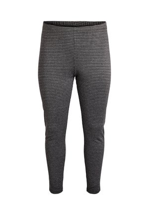 Legíny s černo-bílým vzorem houndstooth, přiléhavého střihu a elastickým pasem, vyrobené z měkkého, lehkého materiálu.