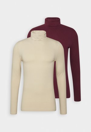 Dos jerséis de cuello alto de manga larga, uno beige y otro burdeos, hechos de un tejido elástico con una textura suave y un diseño ajustado.