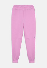 Ružové tepláky s elastickým pásom, bočnými vreckami a malým čiernym logom. Vyrobené z mäkkej, textúrovanej látky. Rovný strih.