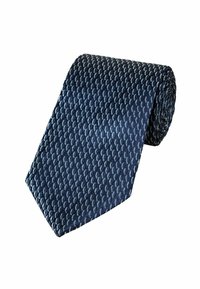 Mørkeblå slips med et struktureret mønster, der har lyseblå halvmåneformer. Stoffet ser glat ud, er rullet og har en spids ende.
