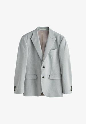 Hellgrauer Herrenblazer mit Schalkragen, zwei schwarzen Vorderknöpfen, drei schwarzen Ärmelknöpfen und drei Vordertaschen, offen getragen.