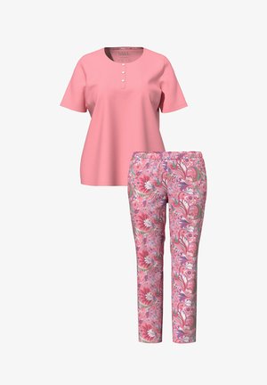 Rosa Kurzarmhemd mit drei Knöpfen, kombiniert mit hoch taillierten, konisch zulaufenden Hosen mit einem Muster aus pinken Blumen und Wirbeln.