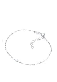 Silverkedja armband med en blixtsymbol. Har en kräftklämma och justerbar längd med en kedjeförlängning. Slät textur.
