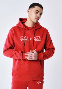 Sudadera roja con bolsillo canguro, impresión de logo blanco "Project x Paris" y cordones. Textura suave y puños acanalados en las mangas y el dobladillo.