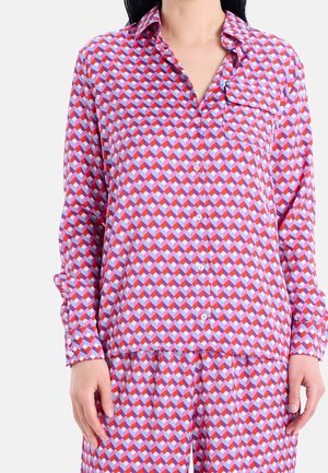 Hemdenhemd mit geometrischem Muster in Lila, Rot und Blau; mit Tasche und langen Ärmeln. Weicher Stoff mit entspannter Passform.