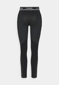 Sorte atletikleggings med høj talje, mærket "CAELIN", teksturerede sidepaneler og tætsiddende design.