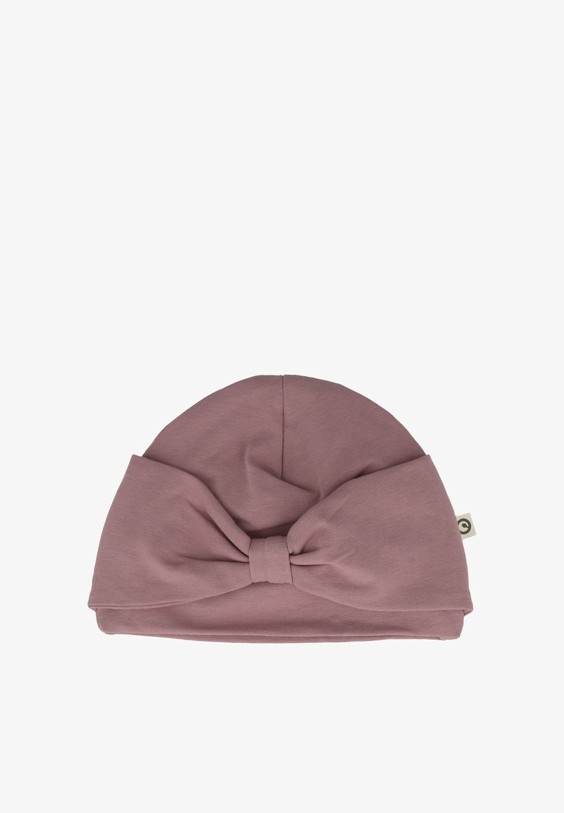 Miękka, różowa bawełniana czapka z zaokrąglonym wierzchem i dużą kokardą z przodu. Posiada metkę po boku. Gładka faktura.