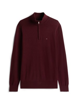 Burgundský pulóver s quartzinovým zipsom a vysokým golierom, s rebrovanými manžetami a lemom. Obsahuje malé logo na hrudi a hladkú pletenú textúru.
