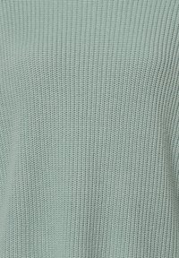 Marie Lund Sweter
