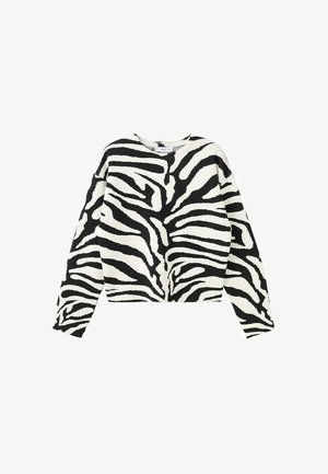 Long-sleeve sweater with black and white zebra print pattern, crew neck, and relaxed fit.
