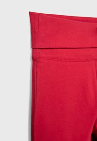 Stradivarius FLARED - Hlače - red