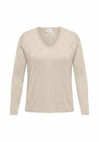 Maglione beige lavorato a maglia con maniche lunghe e scollo a V, caratterizzato da un motivo a onde e una leggera lucentezza. Texture morbida.