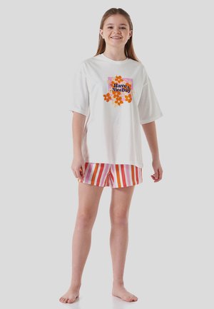 White short-sleeved t-shirt with a floral graphic and "Have a Nice Day" text, paired with striped pink and orange shorts.