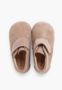 Pair of light brown suede toddler shoes with rounded toes and Velcro straps against a plain white background.
