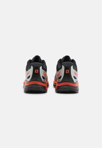 Salomon Sportstyle XT-WINGS 2 UNISEX - Sapatilhas - black/silver/vibrant orange