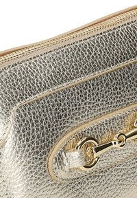 Wojas Taška s příčným popruhem - złoty