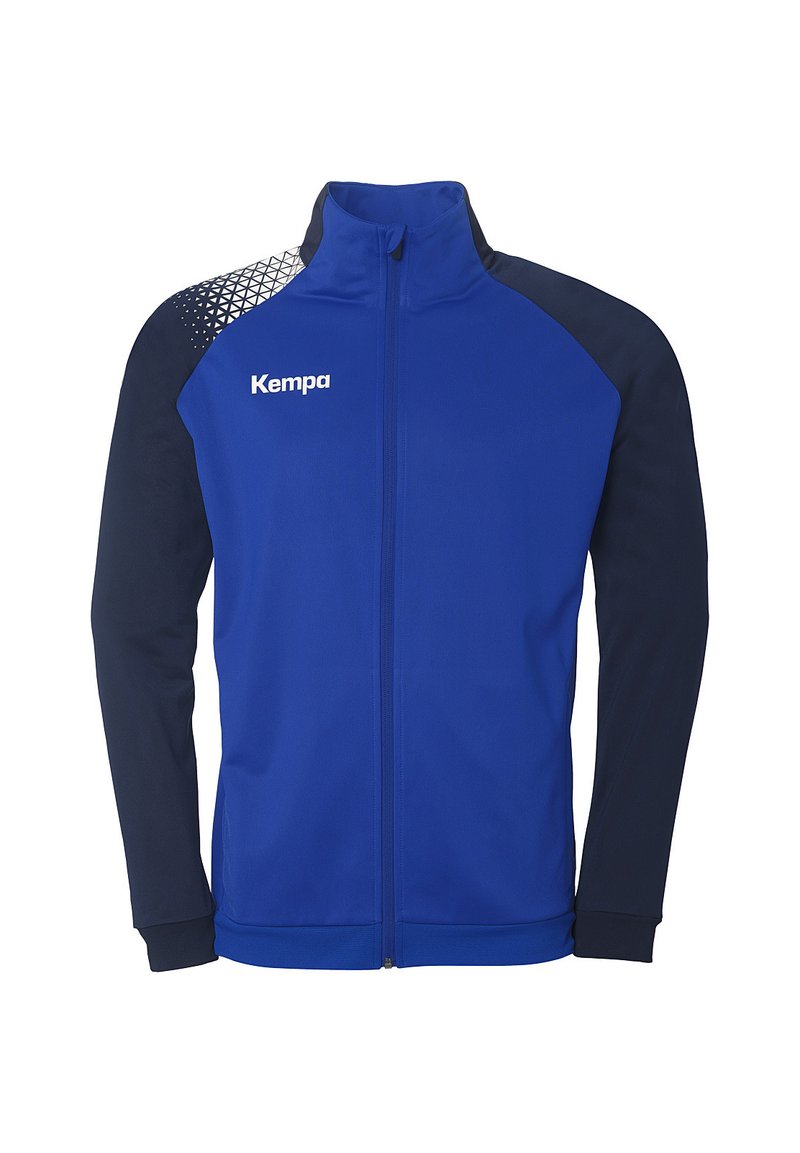 Blå sporty jakke med marineblå ærmer, fuld lynlås og geometrisk mønster på skuldrene. Har "Kempa" logo på brystet.