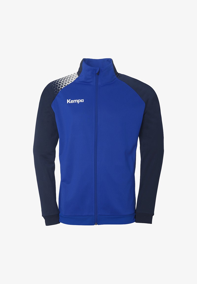 Blå sporty jakke med marineblå ærmer, fuld lynlås og geometrisk mønster på skuldrene. Har "Kempa" logo på brystet.