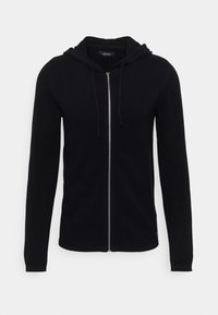 Black zip-up hoodie made of textured fabric, featuring a drawstring hood, long sleeves, and a silver zipper closure.