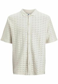 Korte mouwen beige blouse met een kleine kraag en een subtiele geperforeerde geometrische patroontje in de stof.