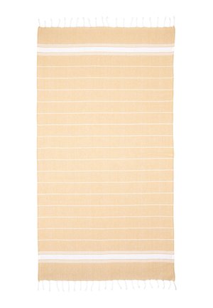 Beige rectangular rug with thin white horizontal stripes and white fringes on both shorter edges, shown flat on a white background.
