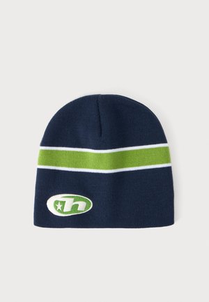 Bonnet en maille bleu marine avec une bande horizontale verte bordée de lignes blanches et un logo ovale vert et blanc comportant une étoile et la lettre "h" à l'avant.