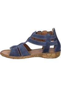 Sandal in pelle blu con design a stella. Presenta una suola testurizzata, più cinghie e dettagli di cucitura. Design open-toe.