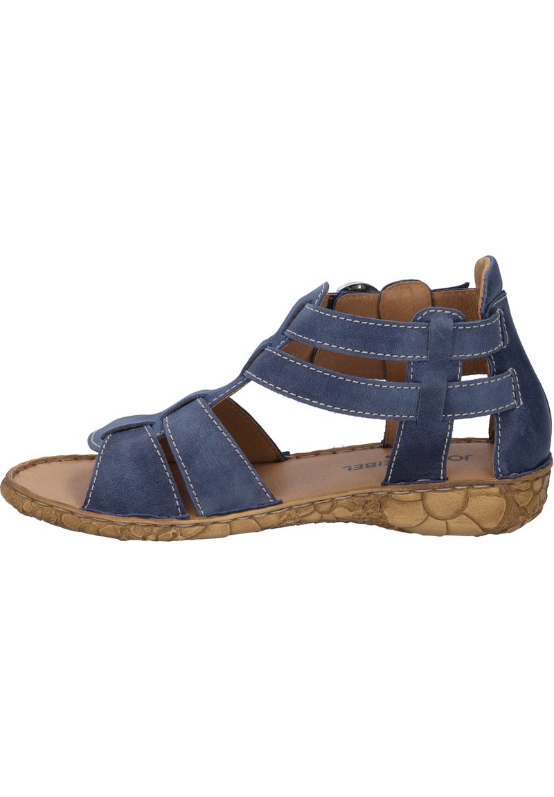 Sandal in pelle blu con design a stella. Presenta una suola testurizzata, più cinghie e dettagli di cucitura. Design open-toe.