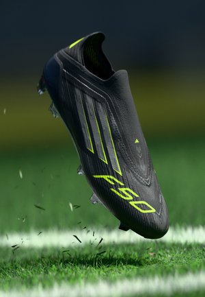 adidas Performance F50 ELITE LL FG - Firm-ground football boots - core black/iron metallic/lucid lemon