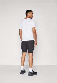 The North Face SUNRISER 2IN1 SHORT 4IN - Sporta šorti - black
