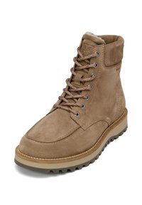 Bruine suede enkellaarzen met een gepolsterde kraag, metalen oogjes, roze veters en een rubberen buitenzool met een profiel. Versterkte neus en hiel.