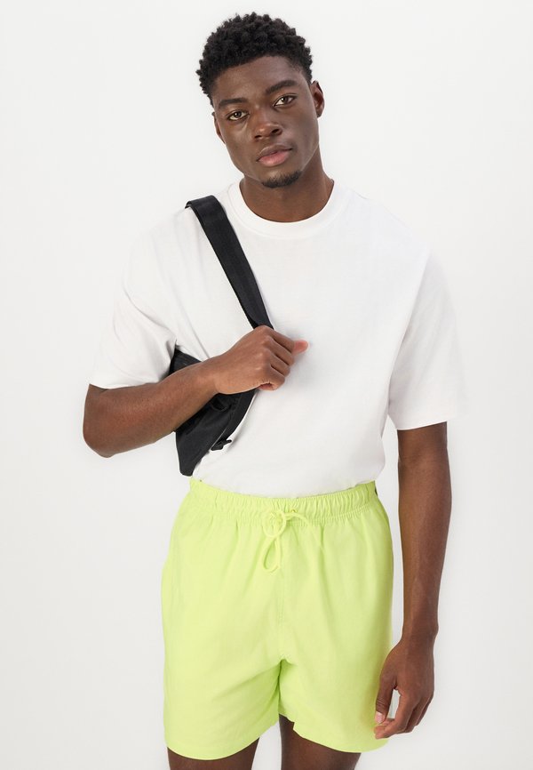 CLUB FLOW - Tracksuit bottoms - lemon twist3