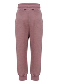 Ljust rosa träningbyxor tillverkade av strukturerad tyg, med elastisk midja och ribbade muddar vid anklarna.