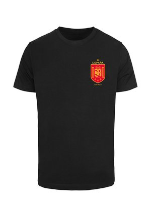 Schwarzes Baumwoll-T-Shirt mit einem roten und gelben Wappen Spaniens auf der linken Brust, mit "ESPAÑA" und "2024" darüber gedruckt.