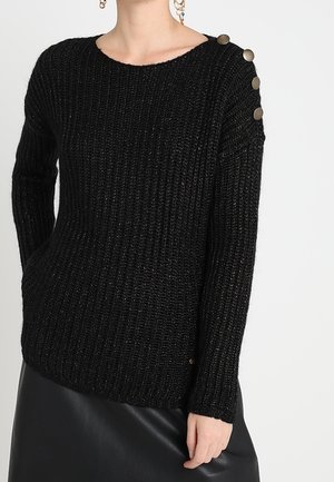 Stickad tröja - black