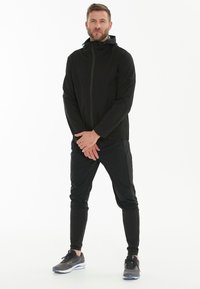Endurance KOMINT - Runningjack -  black