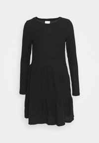 Robe noire à manches longues côtelées avec un col rond, jupe à volants et texture douce, présentant une coupe décontractée et sans embellissements visibles.