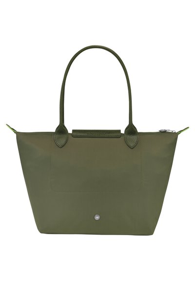 Green nylon tote bag with two handles, a front pocket, and a zip closure. Features textured accents and a metal snap detail at the base.