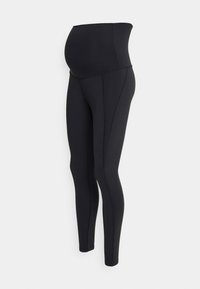 Leggings de maternité noirs avec une taille haute élastique pour le soutien, texture lisse et design ajusté. Coutures décoratives le long des côtés.