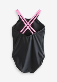 Maillot de bain noir avec une texture lisse et un dos décolleté. Présente des bretelles croisées roses. Design simple et épuré.