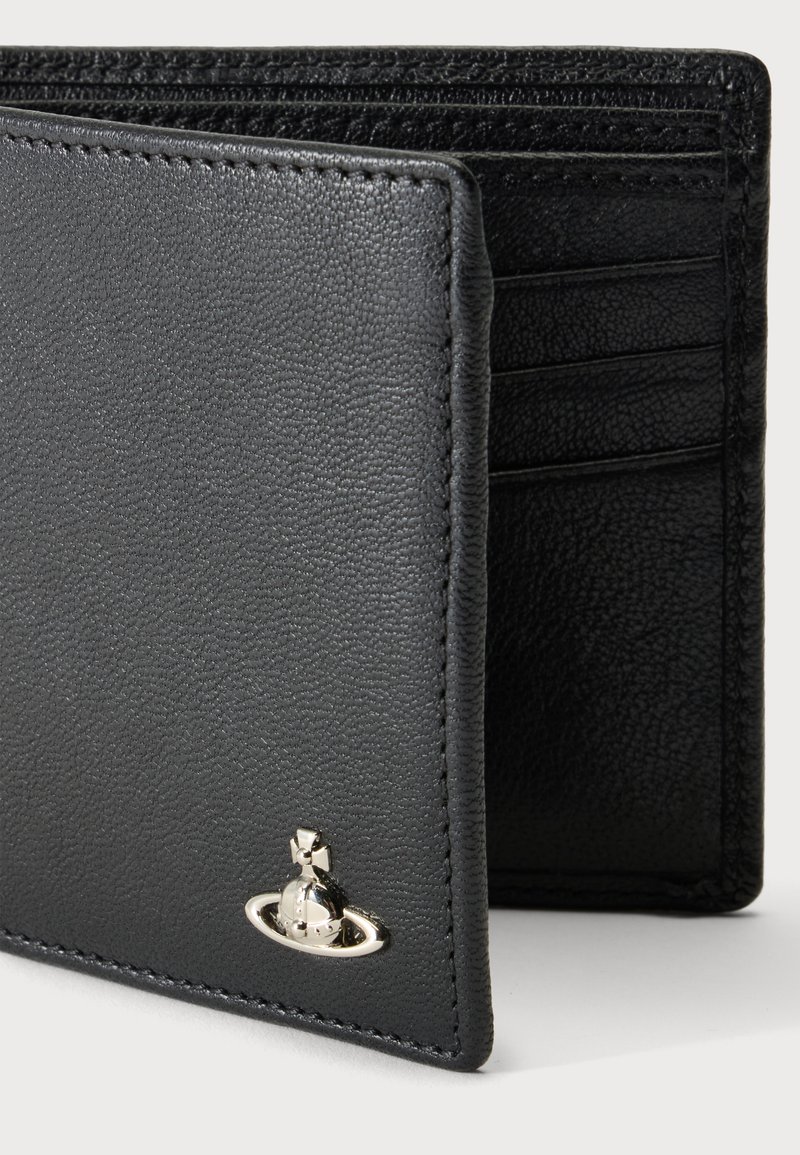 Black leather bifold wallet with a small silver emblem of a planet and cross on the front corner, showing multiple card slots inside.